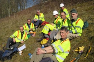 Photo of roadside conservation volunteers resting