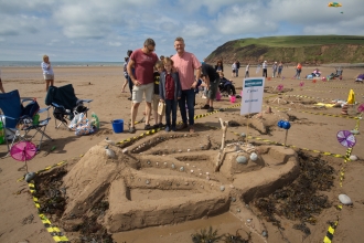 Image of winners of Beached Art sand sculpture competition, 2018