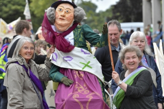 People holding a puppet at Carlisle Pageant 2018