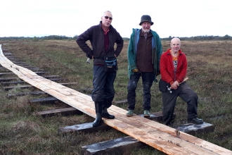Image of volunteers with new boardwalk at Drumburgh Moss