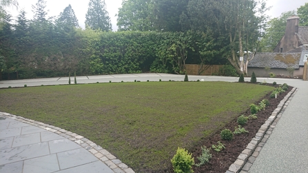 Cedar Manor - reseeded lawn and a new border