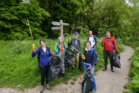 Image of ERT volunteers litter picking along the river in Carlisle credit Stuart Walker Photography