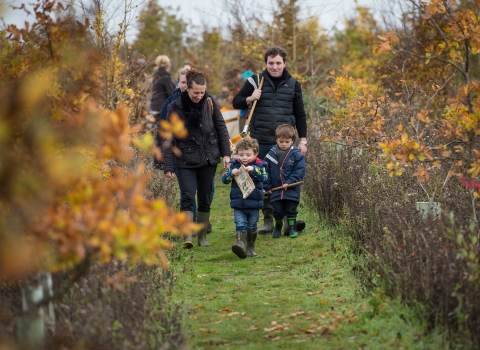 Family walking outdoors in countryside in autumn  -c- Matthew Roberts