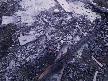 Image of burned wood from hide at South Walney Nature Reserve