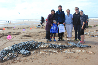 Image of winners of Beached Art sand sculpture competition, 2017