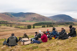 Volunteers enjoying lunch at Eycott Hill © Ben Wolstencroft