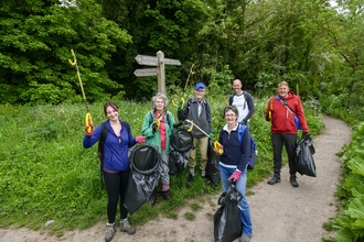 Image of ERT volunteers litter picking along the river in Carlisle credit Stuart Walker Photography