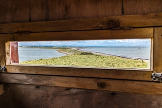 a view from a bird hide at south walney copyright Abi Plowman