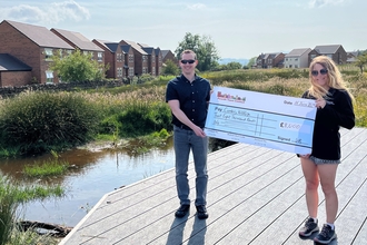Penrith Town Council present large sized cheque to Ami Stidolph at Cold Springs Nature Reserve
