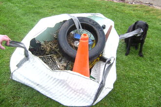 Hippy bag full of collected rubbish