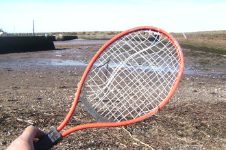 Mangled tennis racket