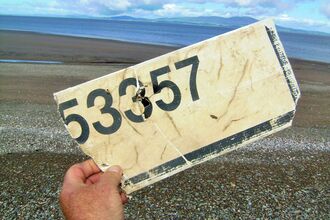 Broken road sign