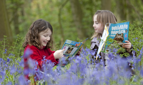 image of Wildlife Watch kids reading magazine - copyright tom marshall 