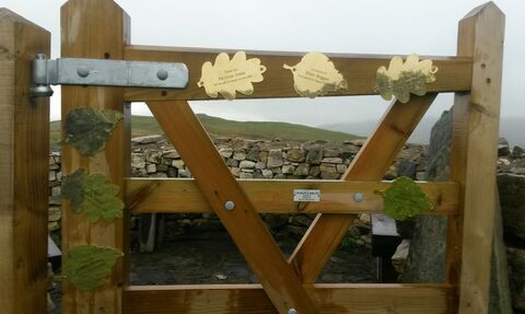 Memory leaves on viewpoint gate at Drumburgh Moss