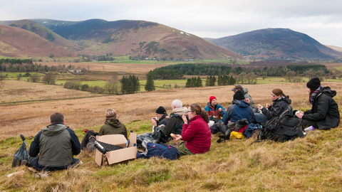 Volunteers enjoying lunch at Eycott Hill © Ben Wolstencroft