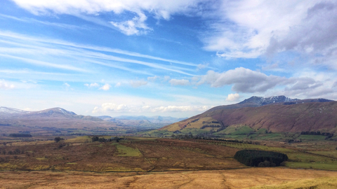 A view of the landscape at Eycott Hill on a sunny day