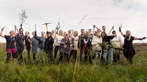 Image of staff at Ticket Tailor cheering on conservation day at Foulshaw Moss Nature Reserve