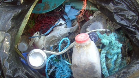 Bin bag full of nasty waste from the beach