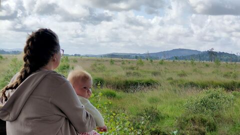 Mother and child at a viewing platform on Foulshaw Moss Nature Reserve