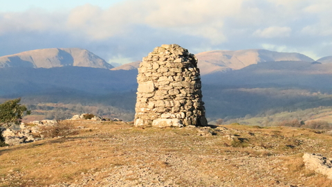 View of The Lake District fells and the cairn on Whitabarrow - Hervey Memorial reserve