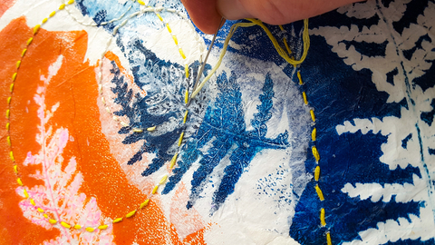 this is a picture of a close up shot of a piece of art created on the Create botanical art with print collage and stitch creative workshop