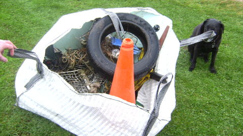 Hippy bag full of collected rubbish