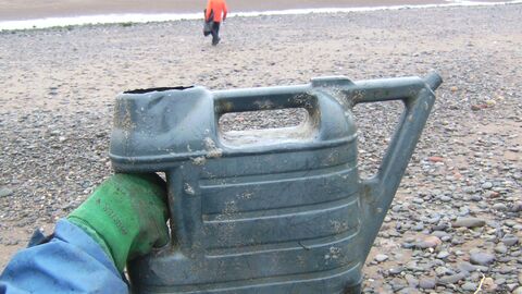 large plastic watering can discovered