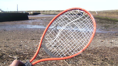 Mangled tennis racket
