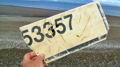 Broken road sign