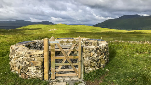 Dry stone wall shelter with gate at Ecyott Hill Nature Reserve