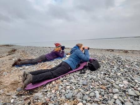 Image of Lucy Mather left and Dani Cifford surveying grey seals at South Walney credit Cumbria Wildlife Trust