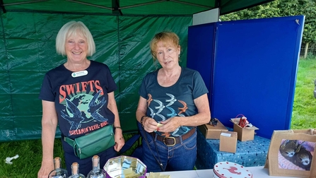 Susan Rowlands, founder & treasurer of Penrith Swift Group & Jennifer Blain Bennett, chair of Penrith Swift Group, at Hesket Newmarket show